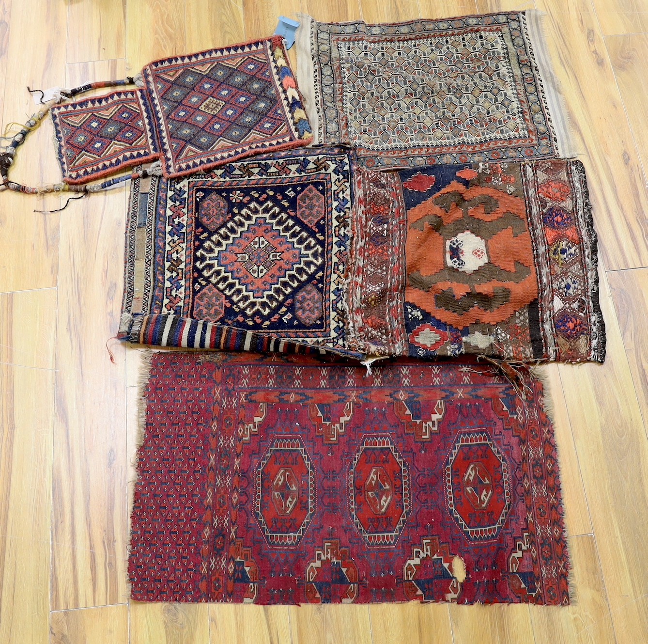 Two carpet saddlebags: Kasquai and a Shamdavan salt bag, a Kilim panel, a Soumac and a Tekke fragment
